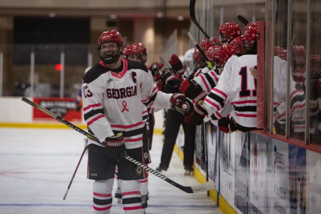 Senior defenseman Cameron Campbell cheers for the goal. On Oct. 15, 2021, the UGA Ice Dawgs take on Clemson at the Classic Center. (Photo/Sidney Chansamone, @sid.chansa)