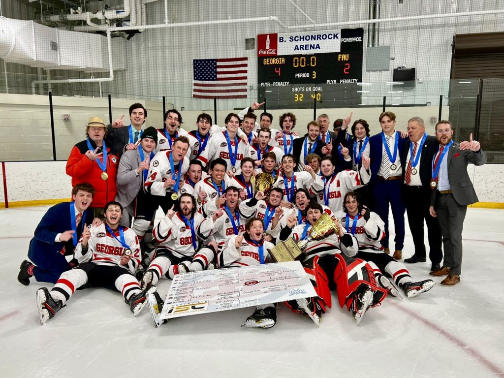The Georgia hockey team poses after winning the CHS championship on March 6, 2022. (Photo courtesy/College Hockey South)
